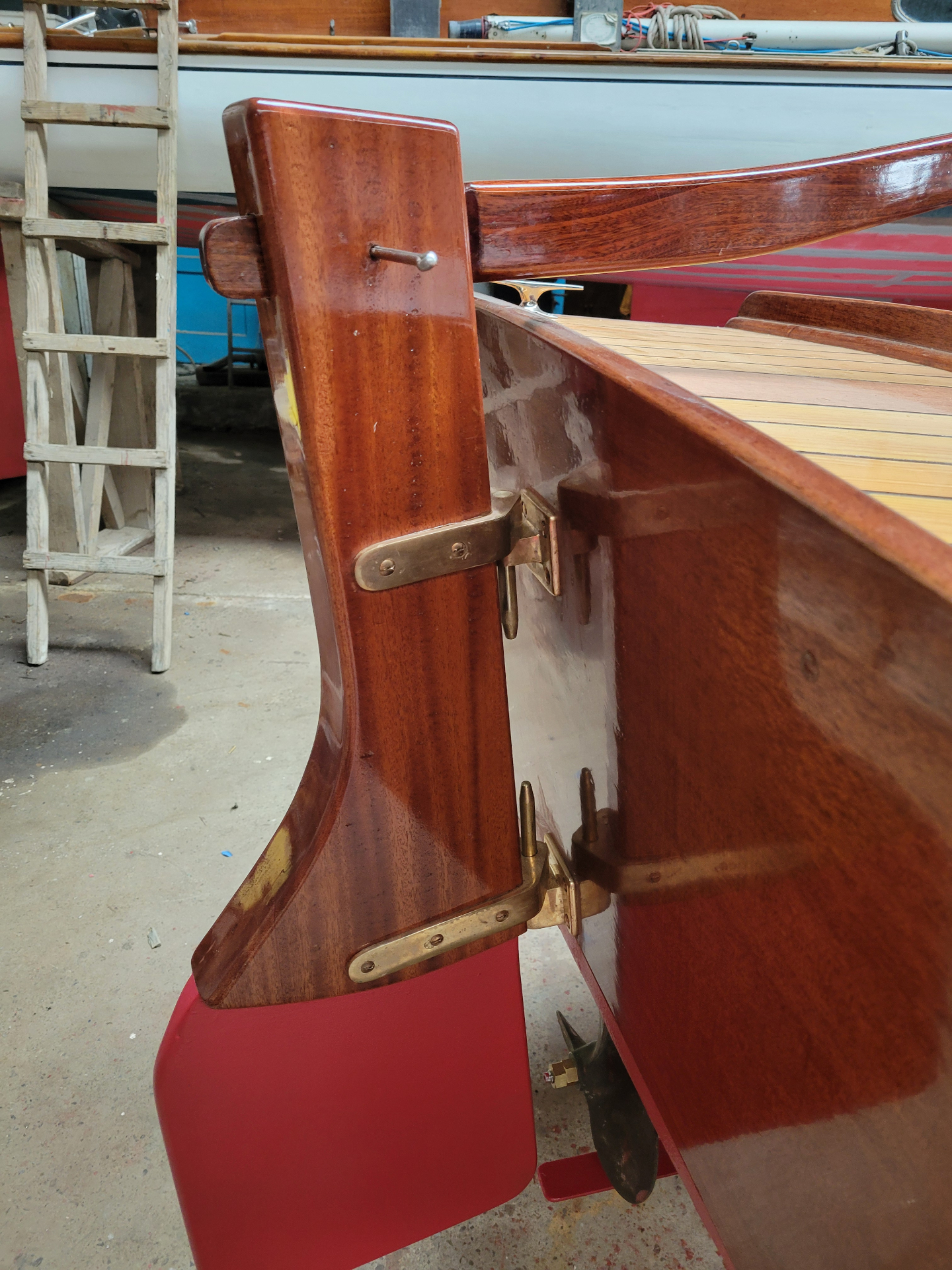 Hand-finished wooden rudder and hull joinery